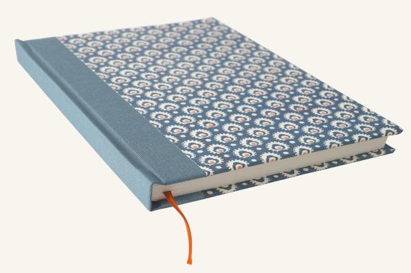 Hardcover drawing book, blue cover with yellow dots, blue cloth spine